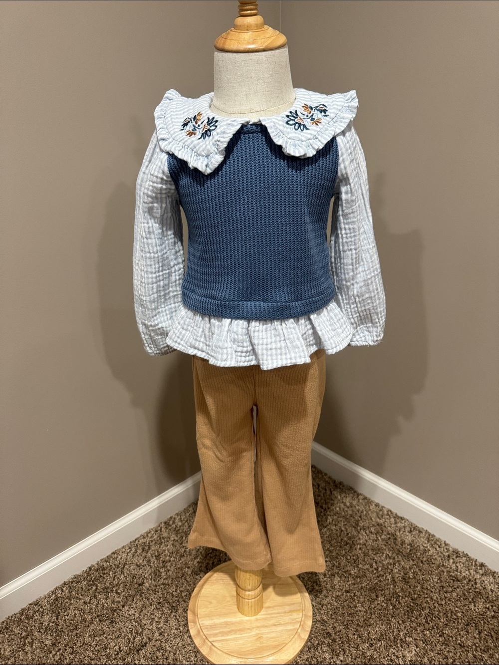 Rachel Zoe Blue Knit Vest Layered Top with Cream Blouse and Tan Pants